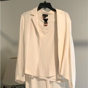 100% silk off-white going-away suit by C’est City, size 8 and M